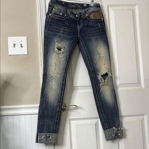 Distressed Blue Jeans